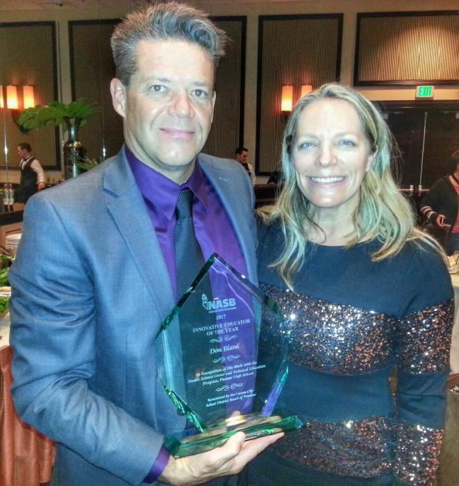 Mr. Bland pictured with his wife Coco Graham.
