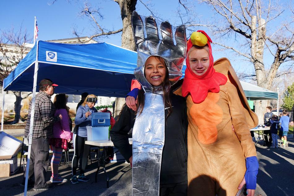 Masyn Navarro in the fork costume joins Isabel Cartier in some pre-Turkey Trot revelry.