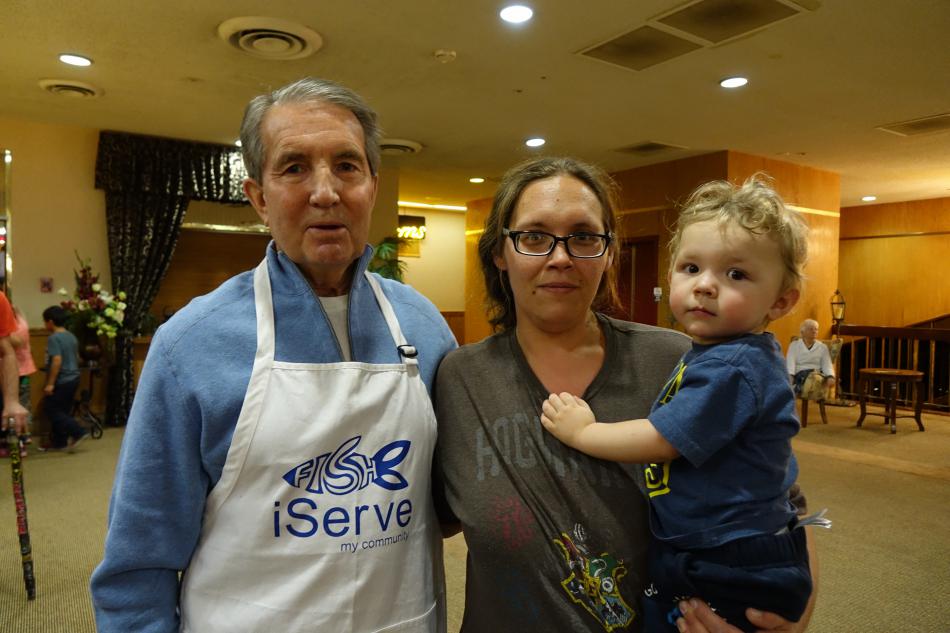 Mayor Bob Crowell poses with Jennifer and Rocco of Carson City