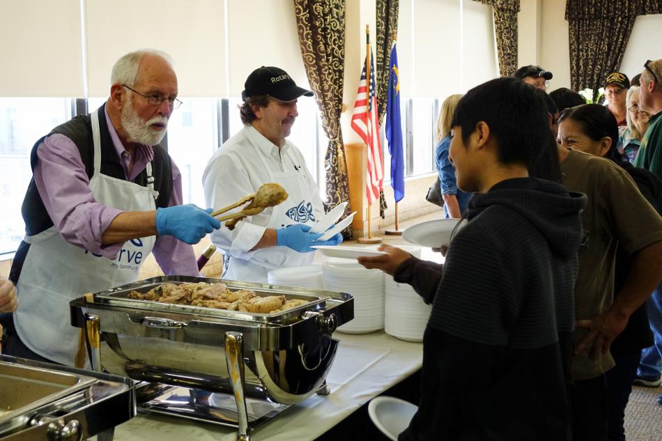 Carson City Supervisor John Barrett serves up a turkey leg