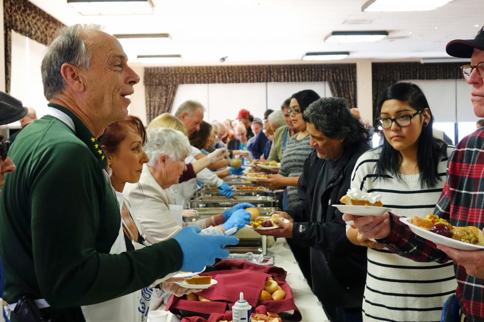 Carson City Sheriff Kenny Furlong serving dessert