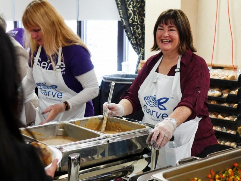 Carson City Supervisor Lori Bagwell serves up the gravy Thursday at the Carson Nugget.