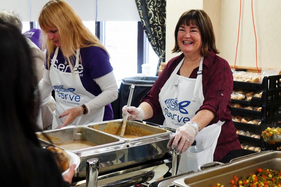 Carson City Supervisor Lori Bagwell serves up the gravy Thursday at the Carson Nugget.