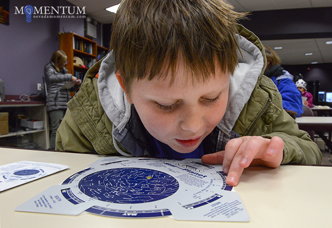 Braxton Hettrick, 10, works with his star and planet finder. Photo: Tim Dunn