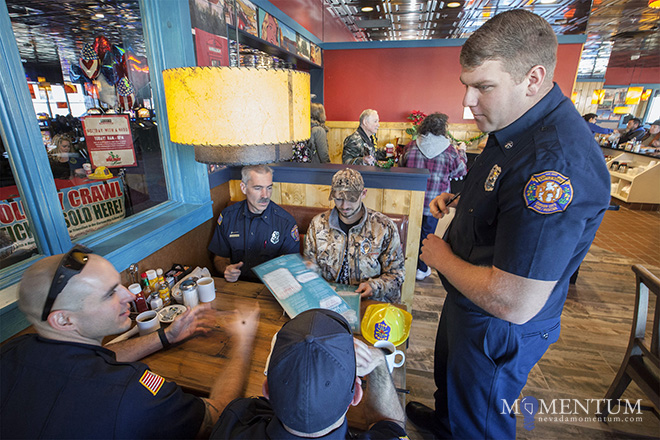 Paramedic Matt Cooper, John Pedrini, Jim and PJ White and Raffi Attashian at Saturday's fundraiser. Rick Gunn/Nevada Momentum