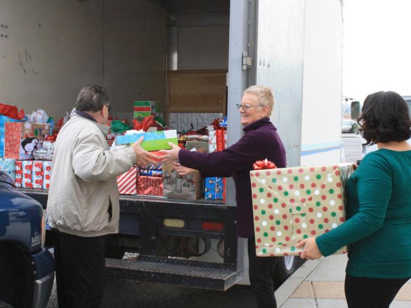 Carson City Senior Center and Carson Tahoe Health employees load gifts bound for delivery to 140 homebound seniors.