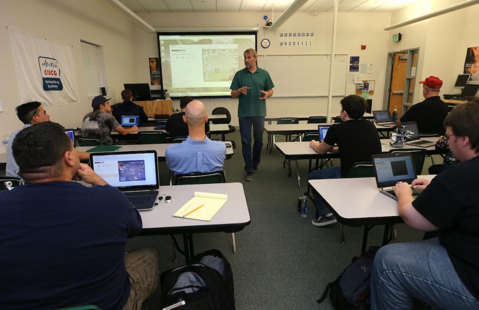 Instructor Dave Riske teaches a Computer Information Technology class at Western Nevada College in Carson City.