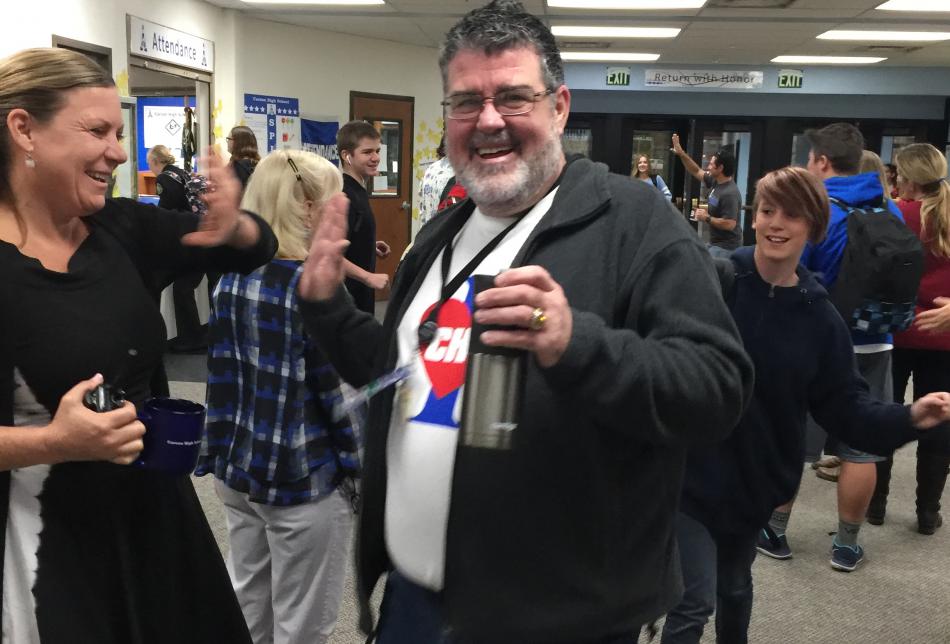 CHS Teachers mobing the halls to welcome students to school.