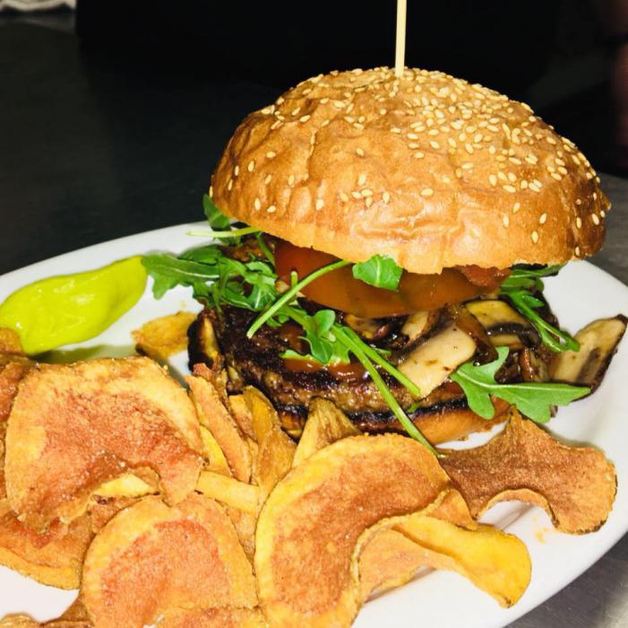 A burger and house made chips. Photo courtesy Bella Vita Bistro