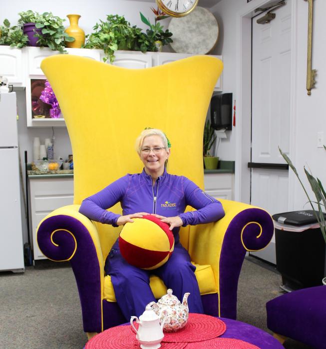 Starr Nixdorf enjoys a relaxing moment in the unique waiting area of Paradise Salon - Spa - Wellness. Photo by Ronni Hannaman
