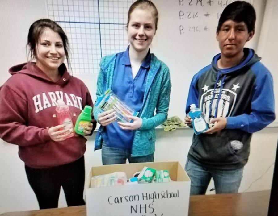 CHS NHS members Sadie Share, Sydney Fields & Chris Luna delivering support to Advocates to End Domestic Violence.