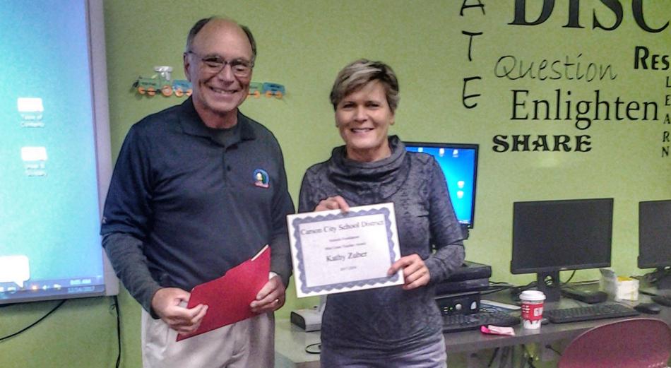 Keith Squires, CCSF board member and retired school administrator, awarding the mini-grant certificate to Kathy Zuber.