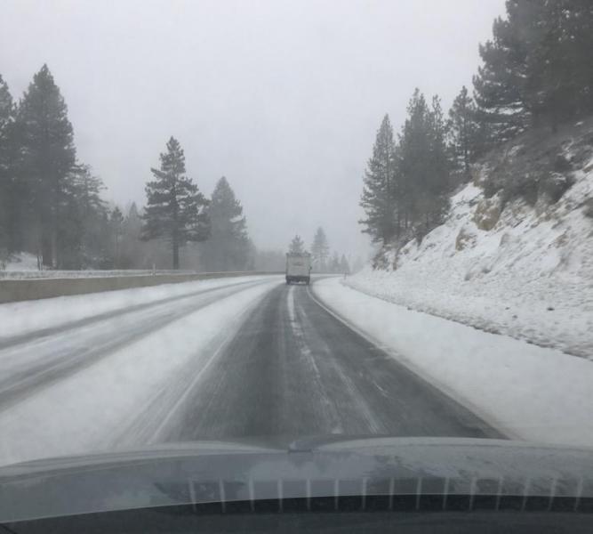 Snow showers along Highway 50 Spooner this morning. Photo by Tahoe Douglas Fire