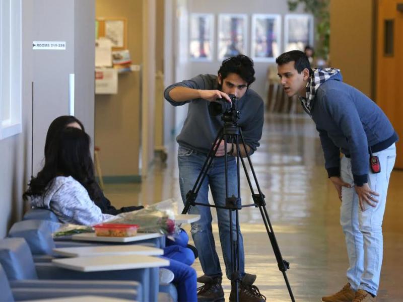 Director Adriel Roman and director of photography Edgar Alejandro, center, with Rising Again Productions, film a movie at WNC.