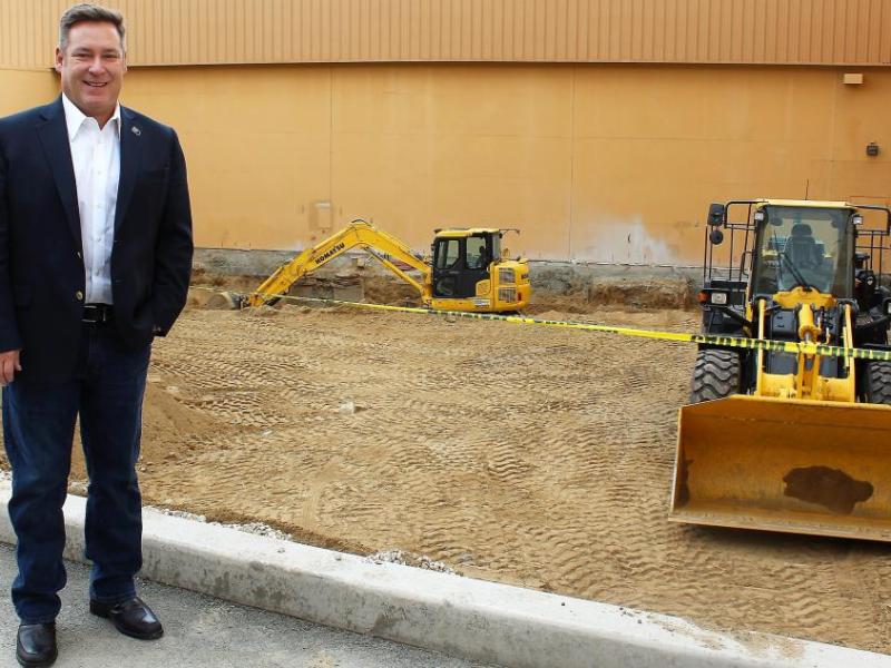 Casino Fandango President and General Manager Court Cardinal at construction area of small convention center.