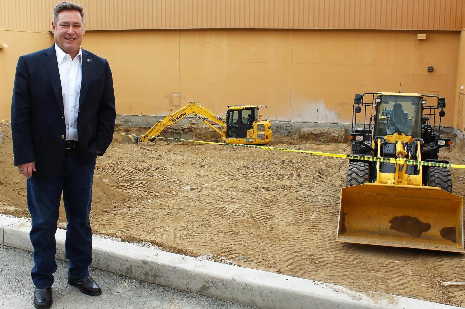 Casino Fandango President and General Manager Court Cardinal at construction area of small convention center.