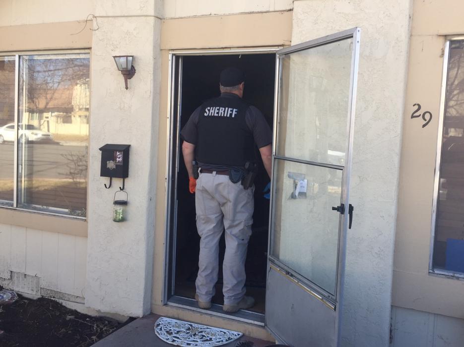 Carson City investigators search a Condor Circle home after a search warrant was obtained.