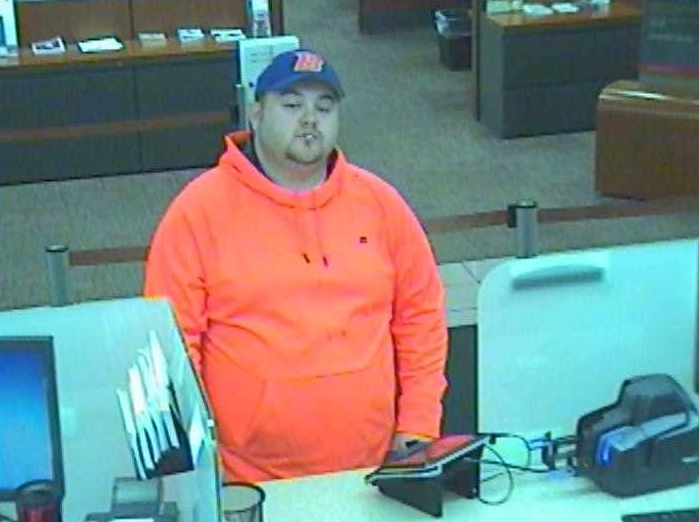Suspect “John Mark” cashing a victim’s check in Carson City.