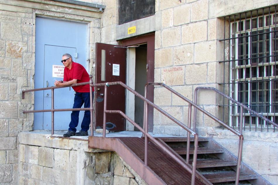 Preservation Society President Glen Whorton looks over the inner yard at the shuttered Nevada State Prison.