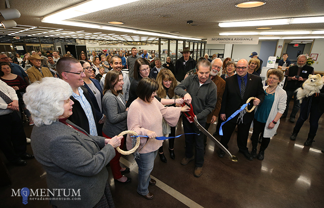 Dignitaries cut a ribbon to celebrate the Grand Reopening at the Carson City Library Friday. Cathleen Allison, Nevada Momentum