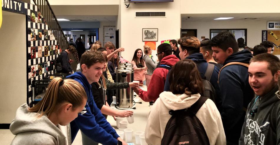 CHS FCA giving free hot chocolate to students.