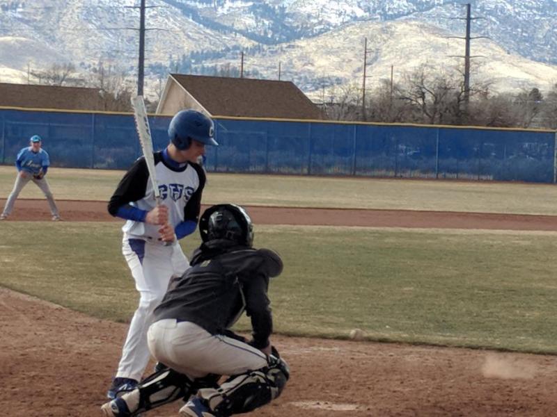 Senior Kyle Glanzmann takes a pitch inside.
