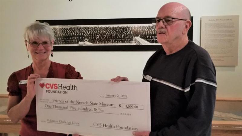 Bob Hilderbrand Accepts $1500 Donation from CVS Manager Kathy Pierson
