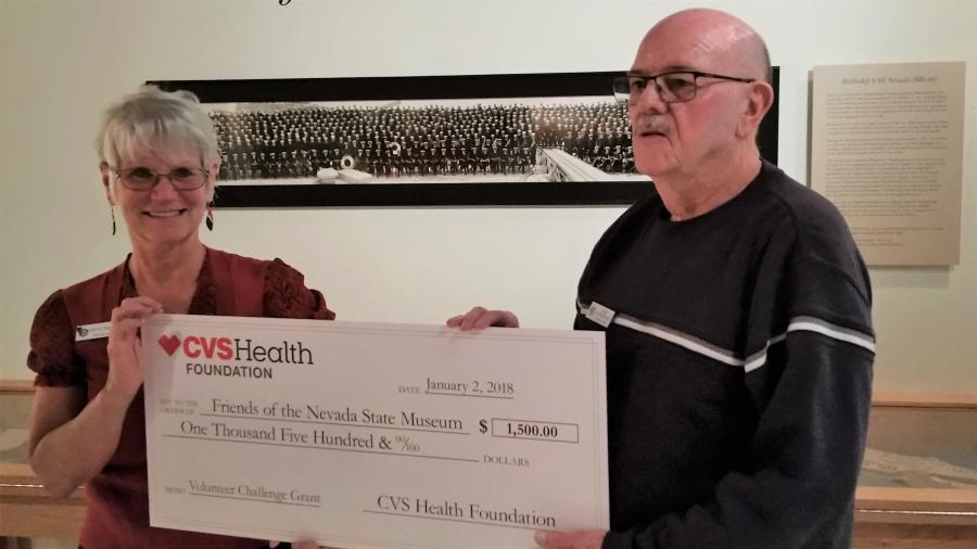 Bob Hilderbrand Accepts $1500 Donation from CVS Manager Kathy Pierson