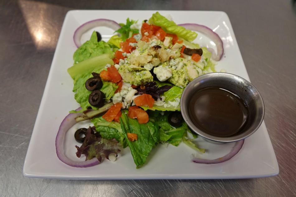 A salad featuring dressing made from scratch.