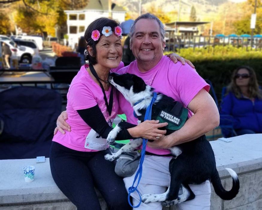 Lily and Brian Reedy with service dog Dempsey.