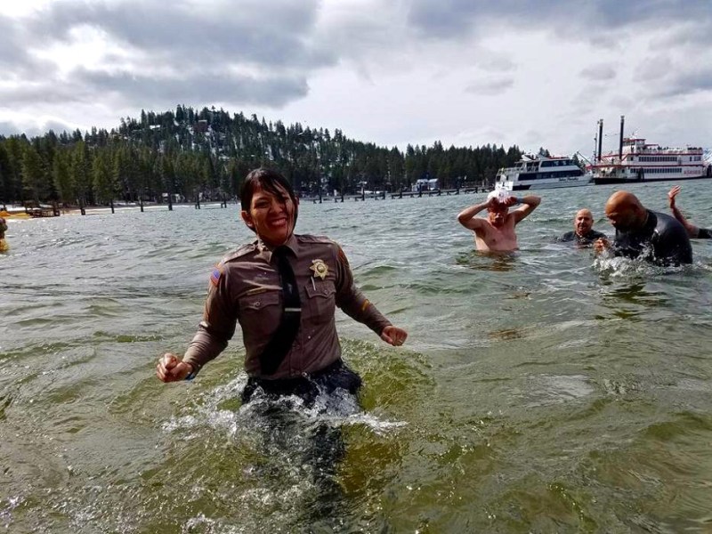 NDOC Correctional Officer Amber Fryer plunges into Lake Tahoe last year. Photo courtesy Monica Navarro