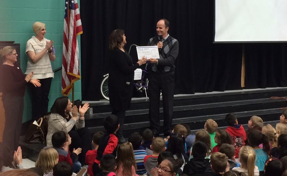 Barnes & Noble hosts an assembly with Mark Twain Elementary staff and students Monday as part of the donation.
