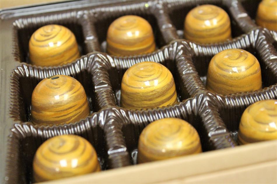 Lavender Honey chocolates ready for finishing artwork touches by Laura Fink.