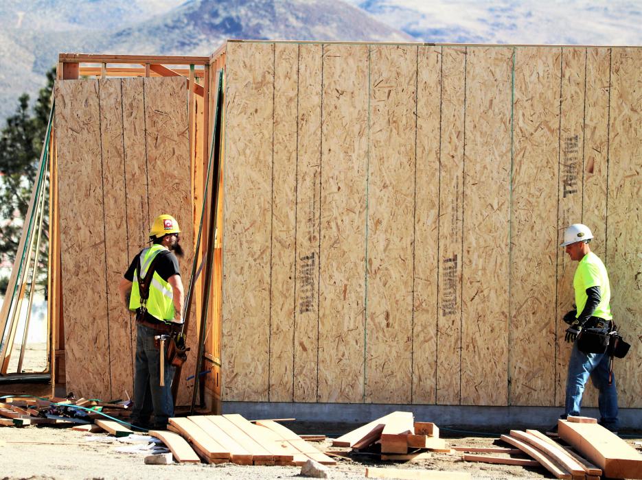 Construction workers on a job site in the Silver Oak Development.