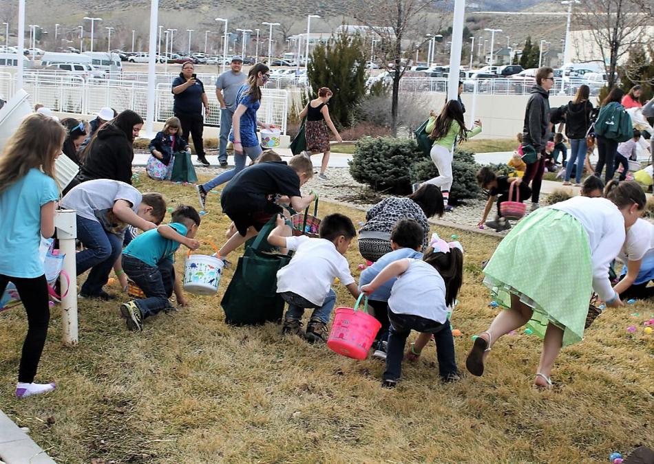 Children gather Easter eggs on the Carson Tahoe Hospital campus Thursday.