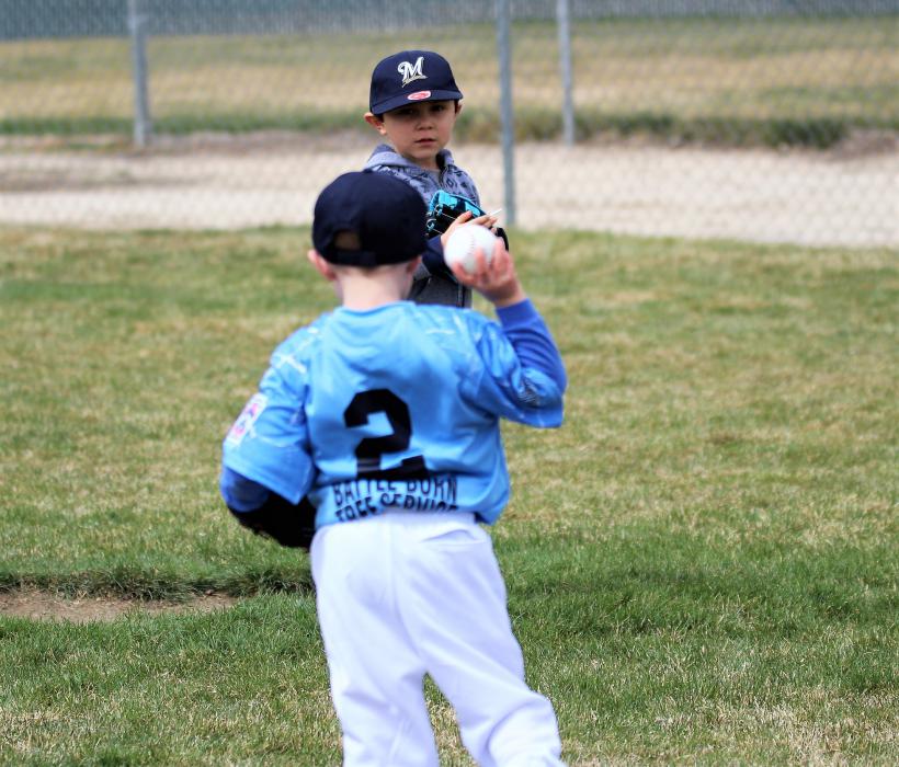 Pitcher throws to first base Saturday at Governor's Field.