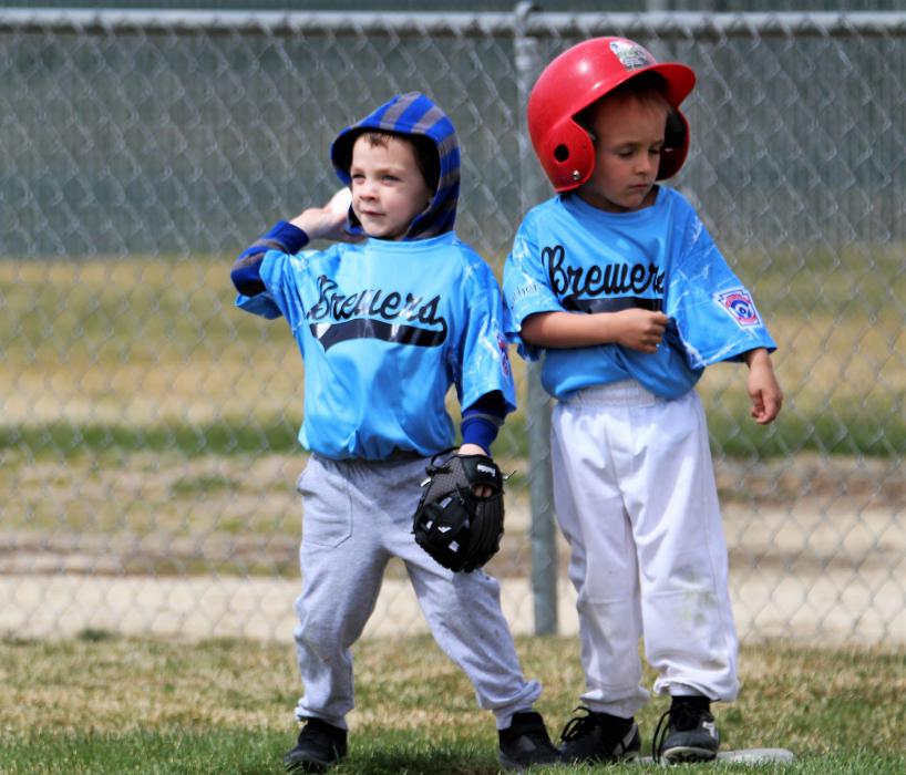 First baseman throws the ball back toward second base Saturday at Governor's Field.