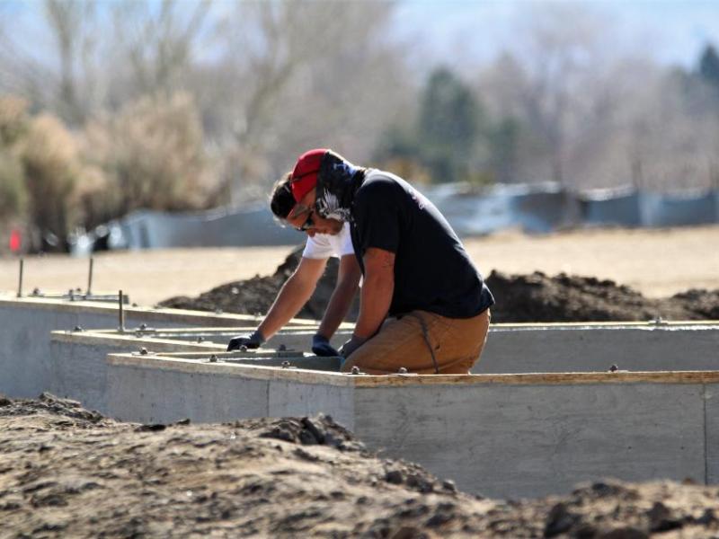 Construction workers rest while working on a foundation in the Silver Oak Development in Carson City. Photo by Brett Fisher