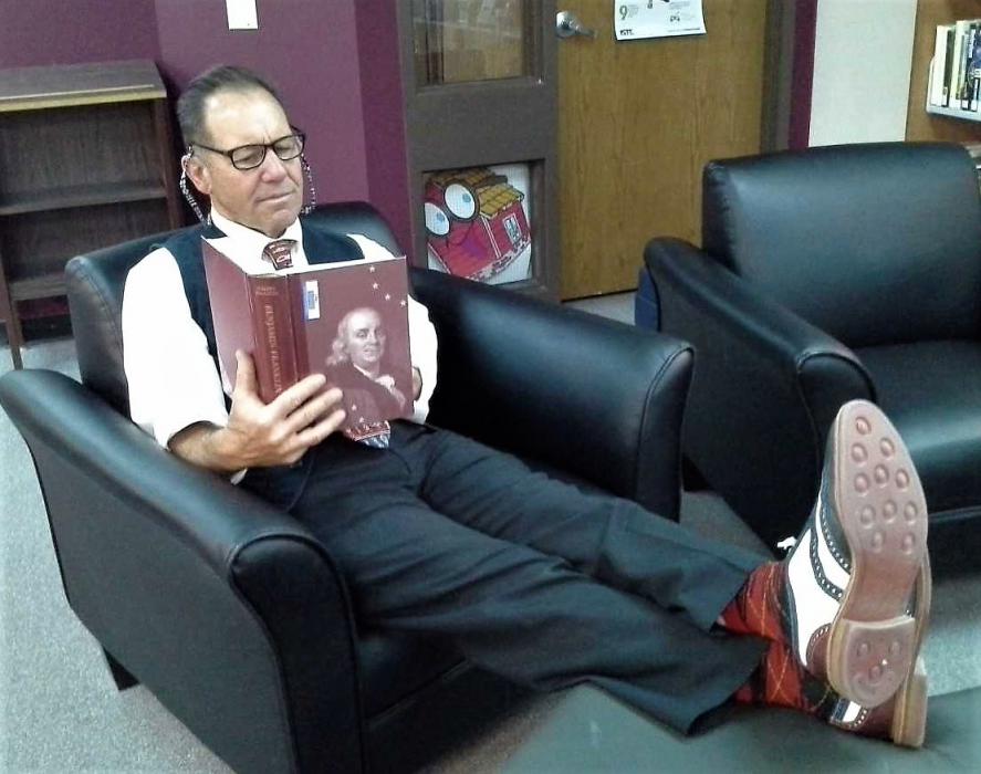 CHS Teacher Mike Malley leisurely participating in the April 12 Dress for Success Challenge.