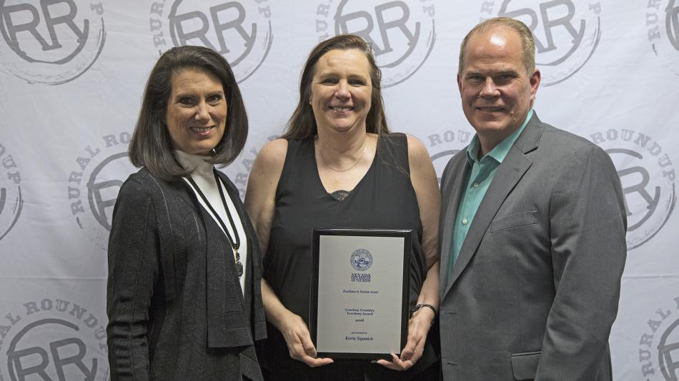 Cindy Carano of NCT, Kerrie Supanich, recipient of the Excellence in Tourism for Cowboy Country Territory; Tom Lester, chair.