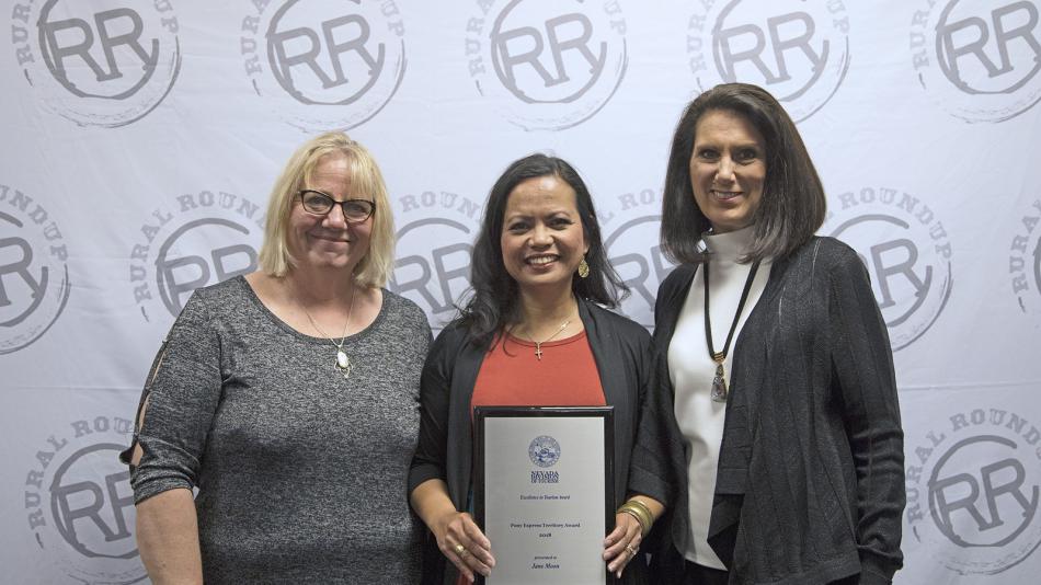 Dee Helming, chair of Pony Express Territory; Jane Moon, recipient of the Excellence in Tourism award; Cindy Carano of NCT