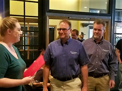 Jeff Shaheen, left, and Mark Beauchamp, right, founders of Shaheen Beauchamp Builders, presented with a Senatorial Certificate.