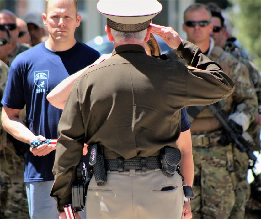 The baton runner is saluted at the Nevada Law Enforcement Officers Memorial.