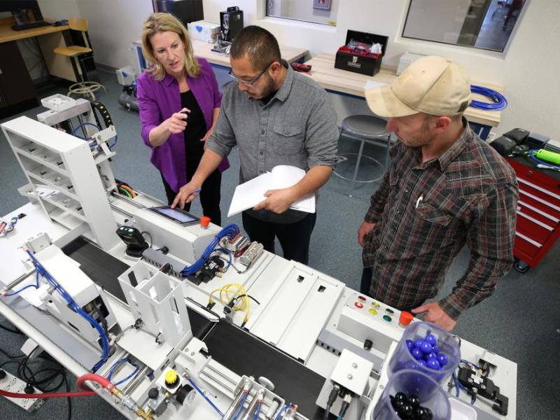 Emily Howarth, left, an Electronics and Industrial Technology professor at WNC, will oversee training sessions.