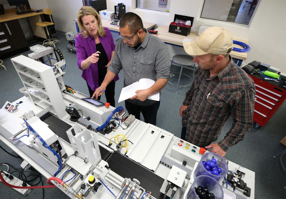 Emily Howarth, left, an Electronics and Industrial Technology professor at WNC, will oversee training sessions.