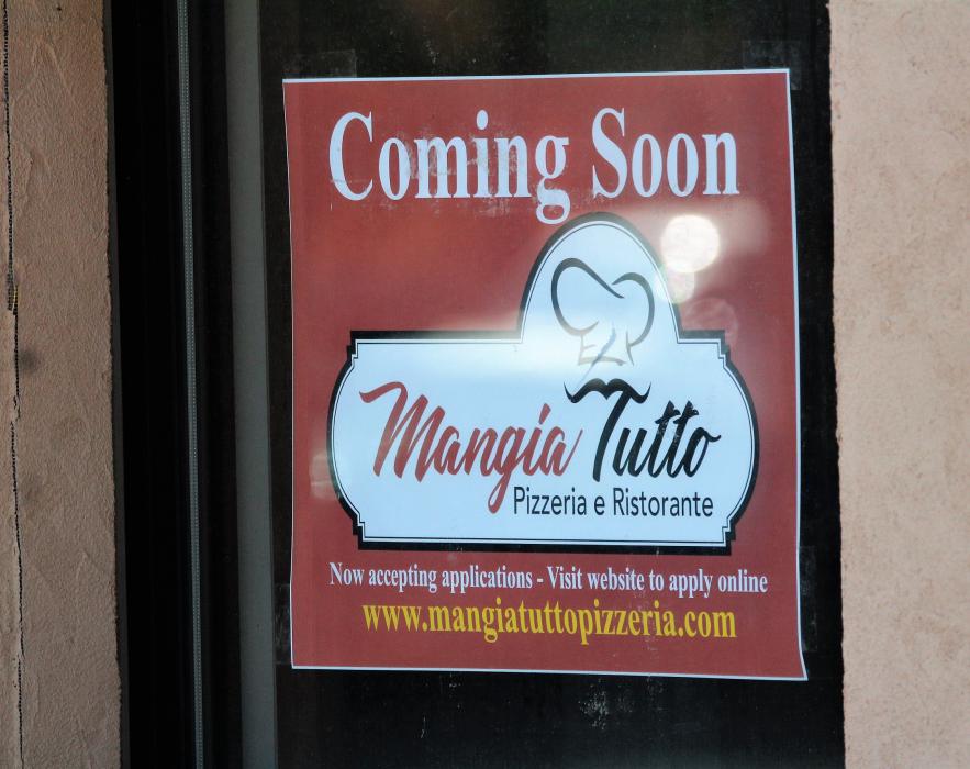 Photo by Brett Fisher. Sign in the window at 200 N. Stewart St.
