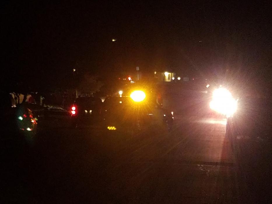 Photo by Brett Fisher. Emergency vehicles set up a perimeter along Haystack Drive.
