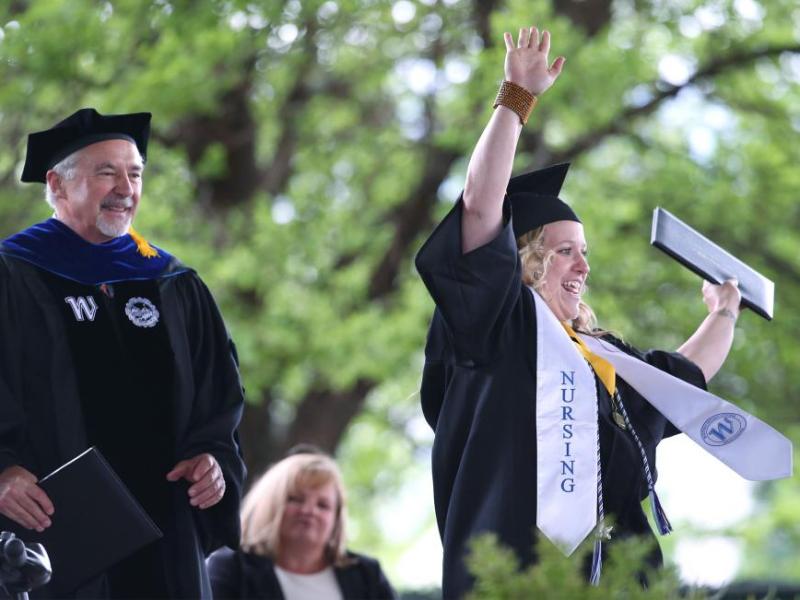 Nursing graduate Amelia Edwards celebrates after receiving her WNC diploma Monday. Photo by Cathleen Allison, Nevada Momentum