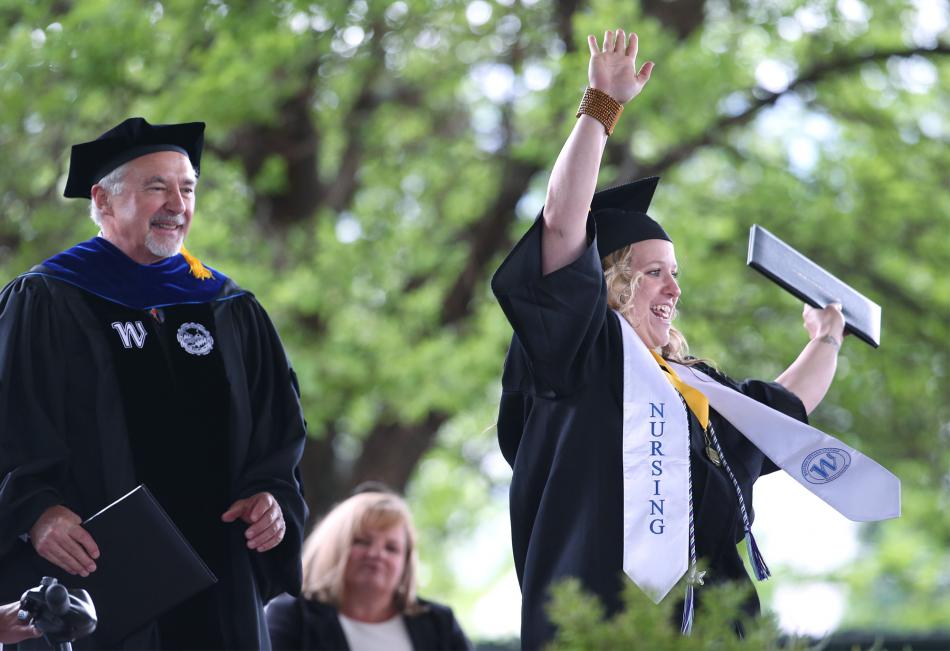 Nursing graduate Amelia Edwards celebrates after receiving her WNC diploma Monday. Photo by Cathleen Allison, Nevada Momentum