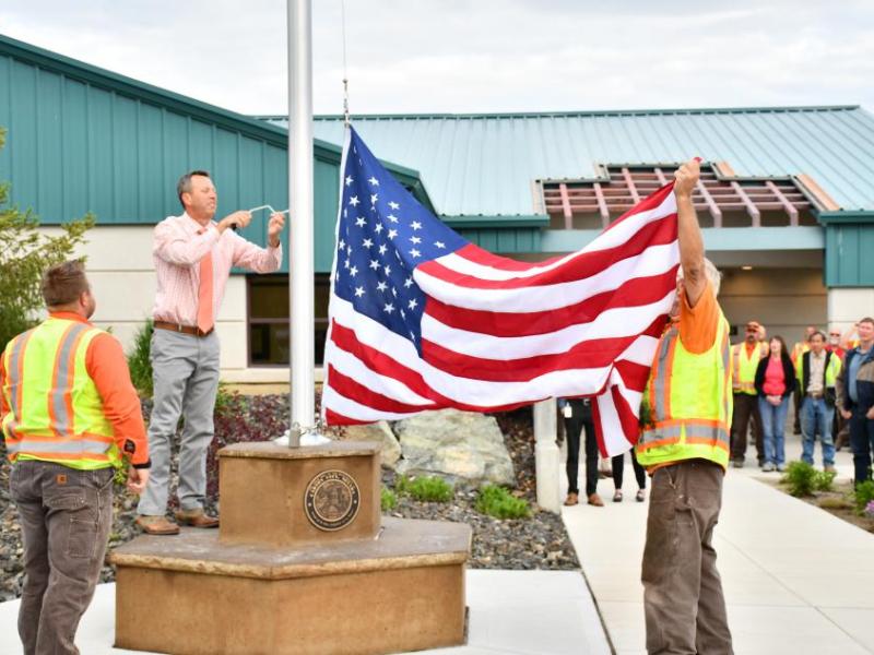 Carson City Public Works members gathered Wednesday in front of the new flag pole.